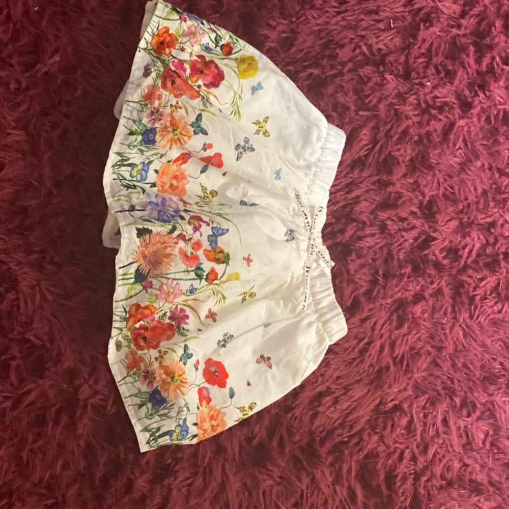 White skirt with floral design